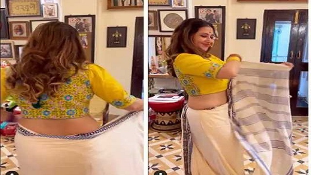 ক্যামেরার সামনে এক মিনিটে শাড়ি পড়লেন স্বস্তিকা, মুগ্ধ নেটিজেনরা