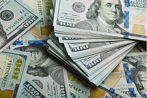 Dollar falls sharply as trade war escalates