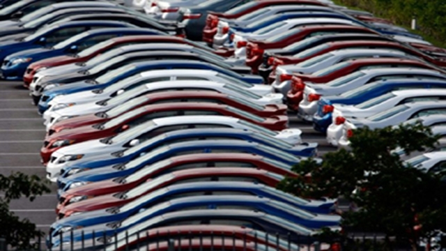 Asian investors shift cautiously, autos hit by US tariff threat
