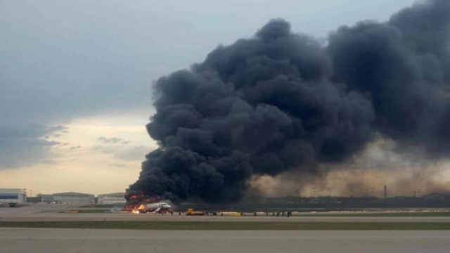 Passenger plane on fire makes emergency landing in Moscow